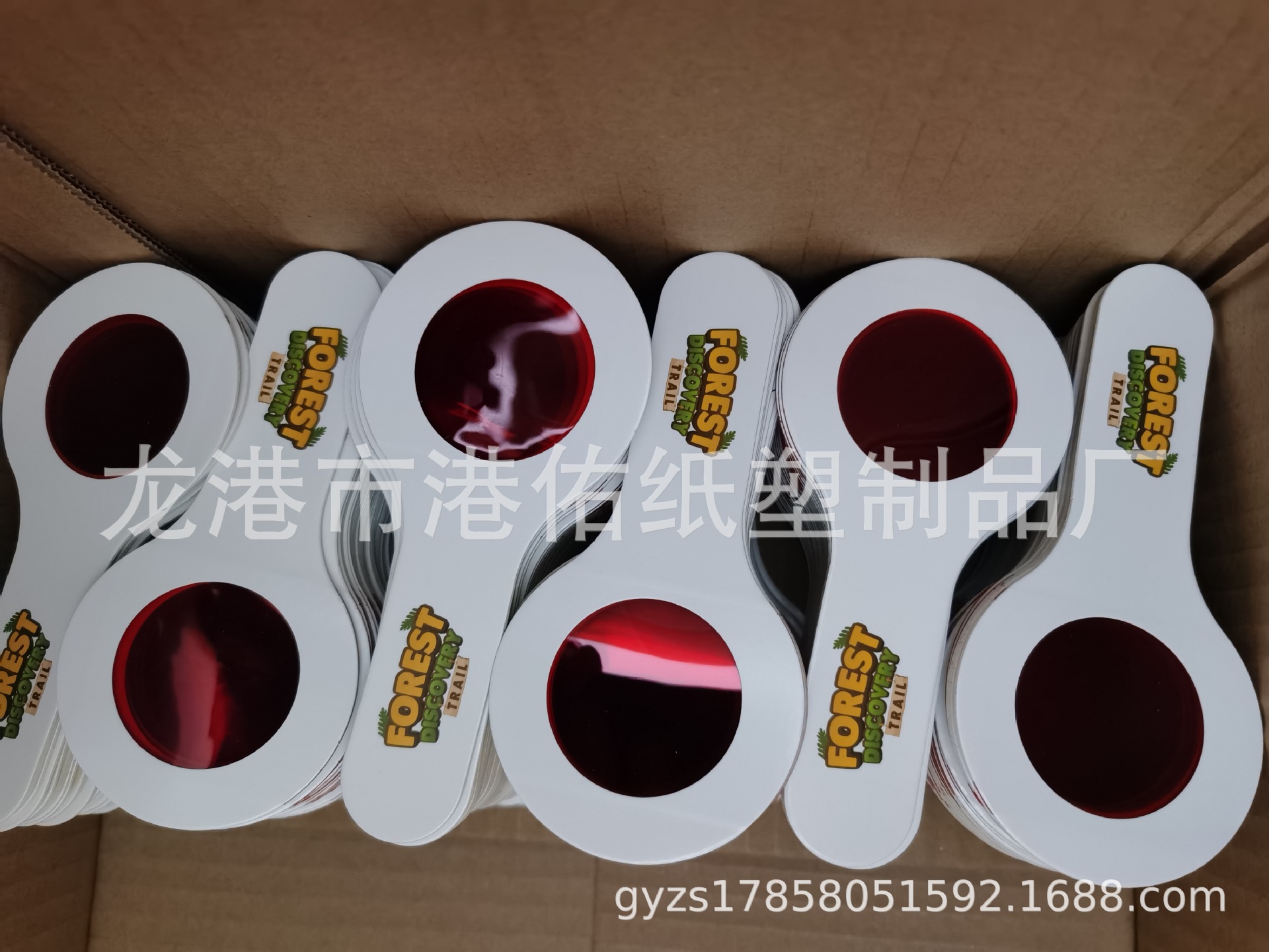 Hand-held decoding glasses red lens decoder