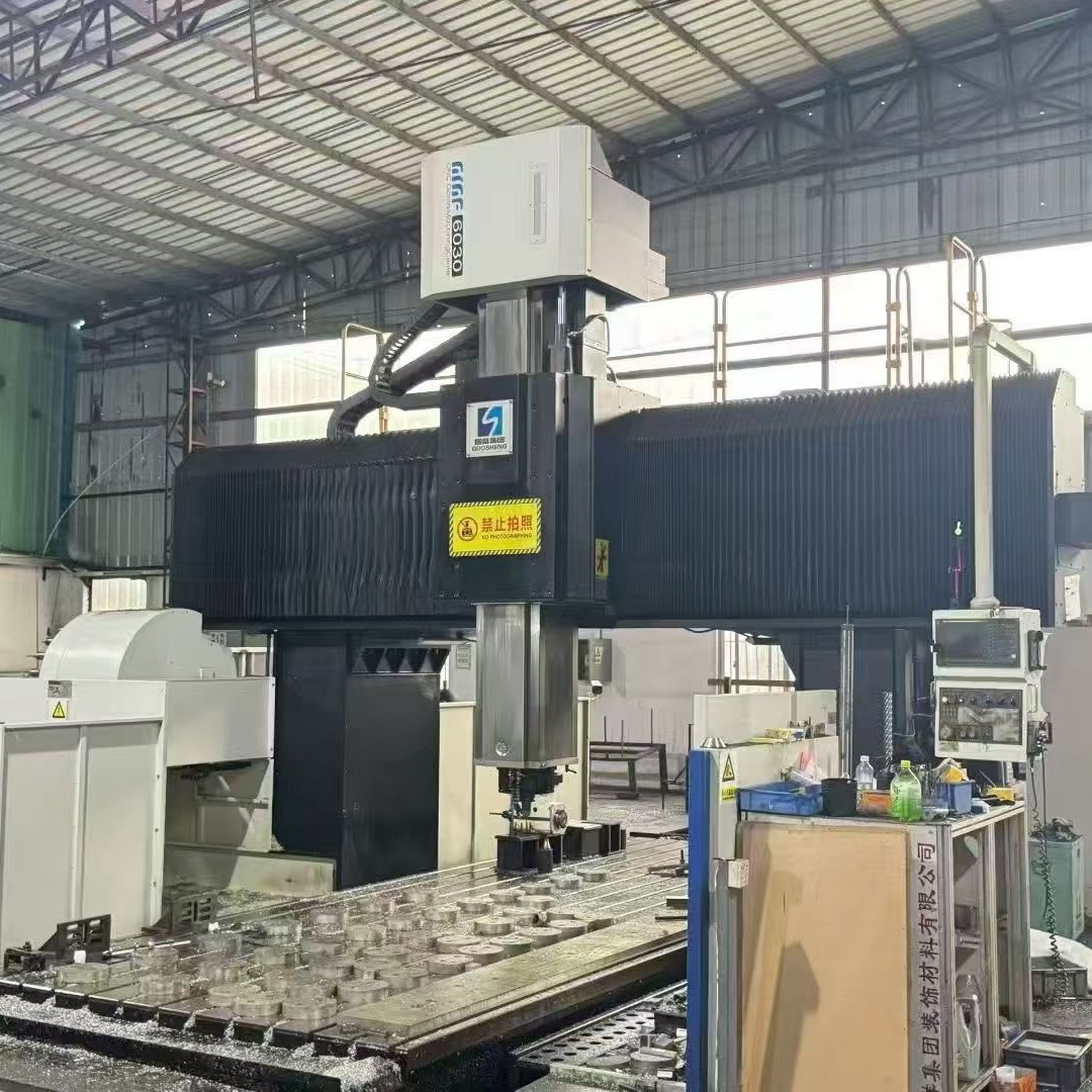 Transfer of Second-Hand Guosheng Gmf6030 Gantry Machining Center Spindle Speed 5000 in Stock