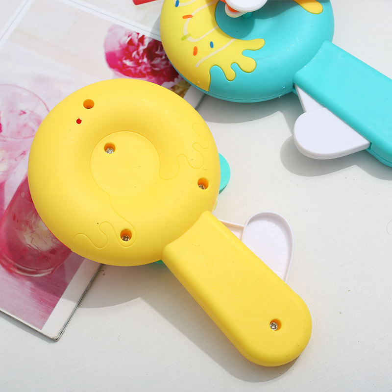 Children's hand pressure fan creative animal spaceman cross-border manual hand crank small fan toy gift fan wholesale