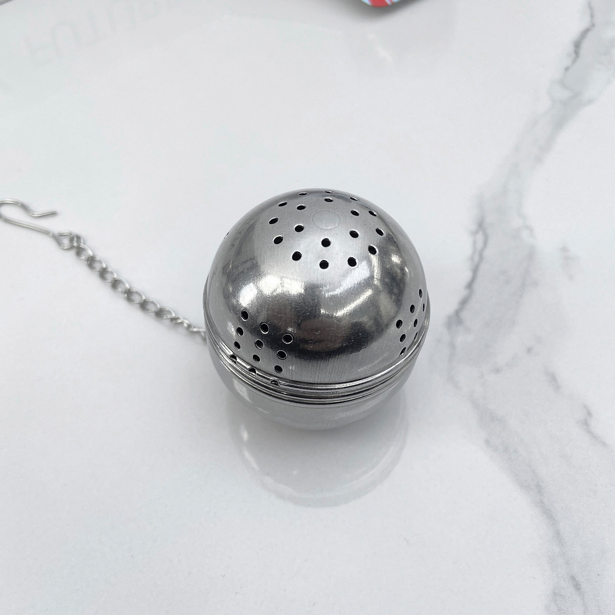 Cross-border stainless steel seasoning ball kitchen spice filter ball with chain tea drain filter halogen ball seasoning cage Weibao