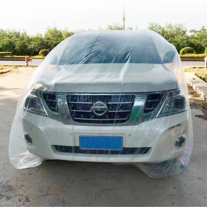 Wholesale car disposable car clothing cover full car transparent rainproof dust cover thickened universal plastic car clothing protection