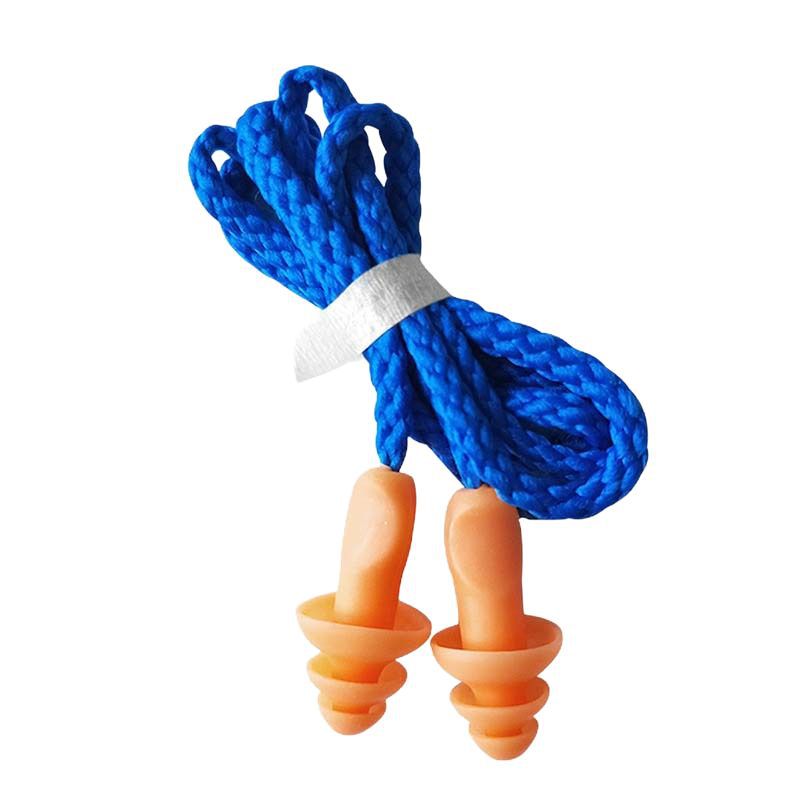 Earplugs can reduce noise and sound insulation. Washable silicone sound insulation earplugs for factory workshops. Christmas tree with cable sleep earplugs