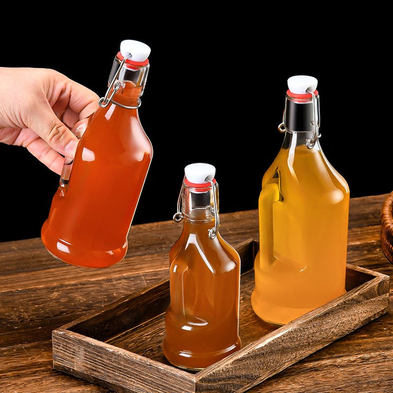 Le buckle glass bottle transparent sealed round square buckle glass bottle juice enzyme wine bottle homemade fruit wine white wine