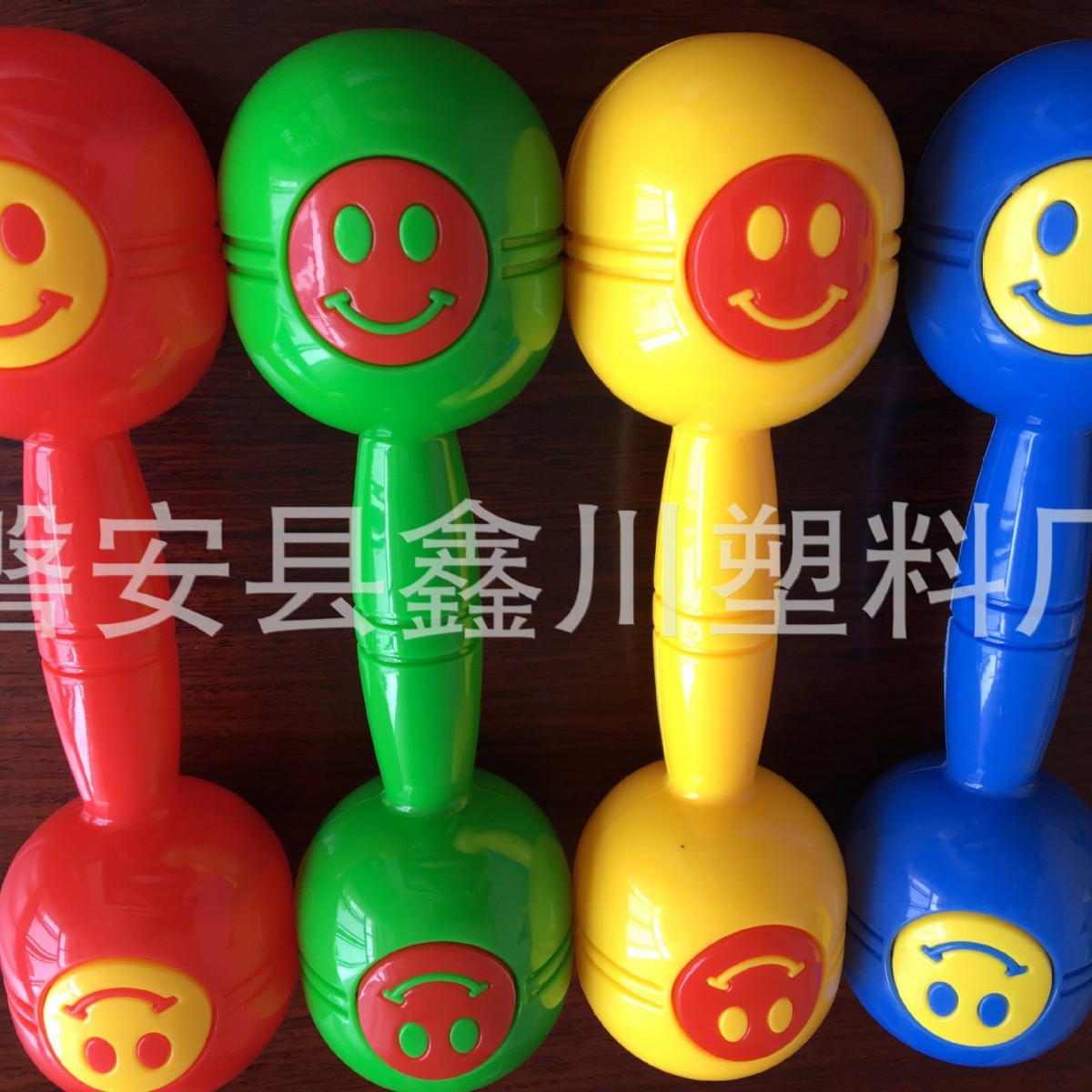 Kindergarten children morning exercise dumbbell rattle wholesale large size smiley face dumbbell gymnastics dumbbell smiley face dumbbell
