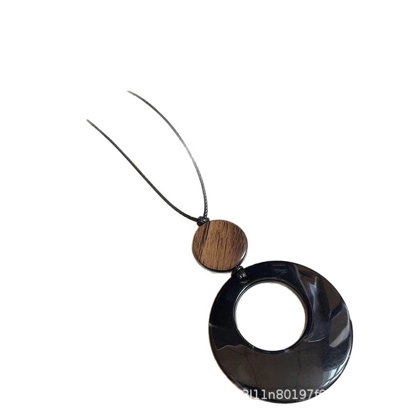 New Chinese Style Hollow Wooden Round Pendant Necklace Women's Ethnic Style Niche Design Sweater Chain Retro Halter Accessories