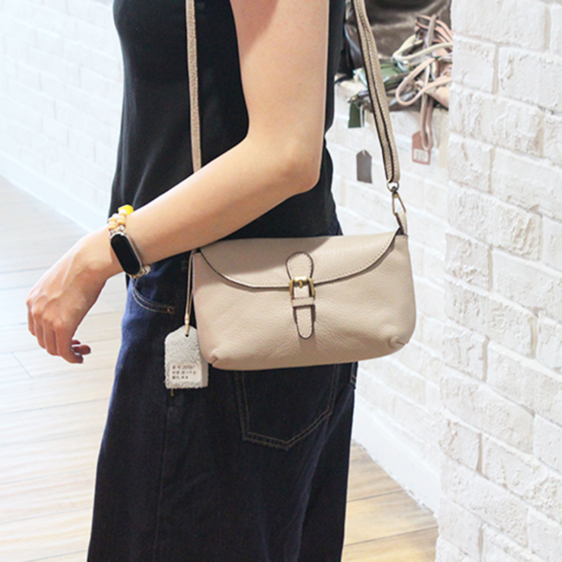 New first layer cowhide small satchel women's simple mobile phone bag shoulder bag Korean style retro artistic small and exquisite crossbody bag