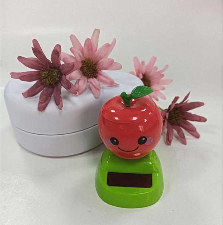 Hot Selling Apple Moving Solar Car Ornaments,left and Right Swing Toys