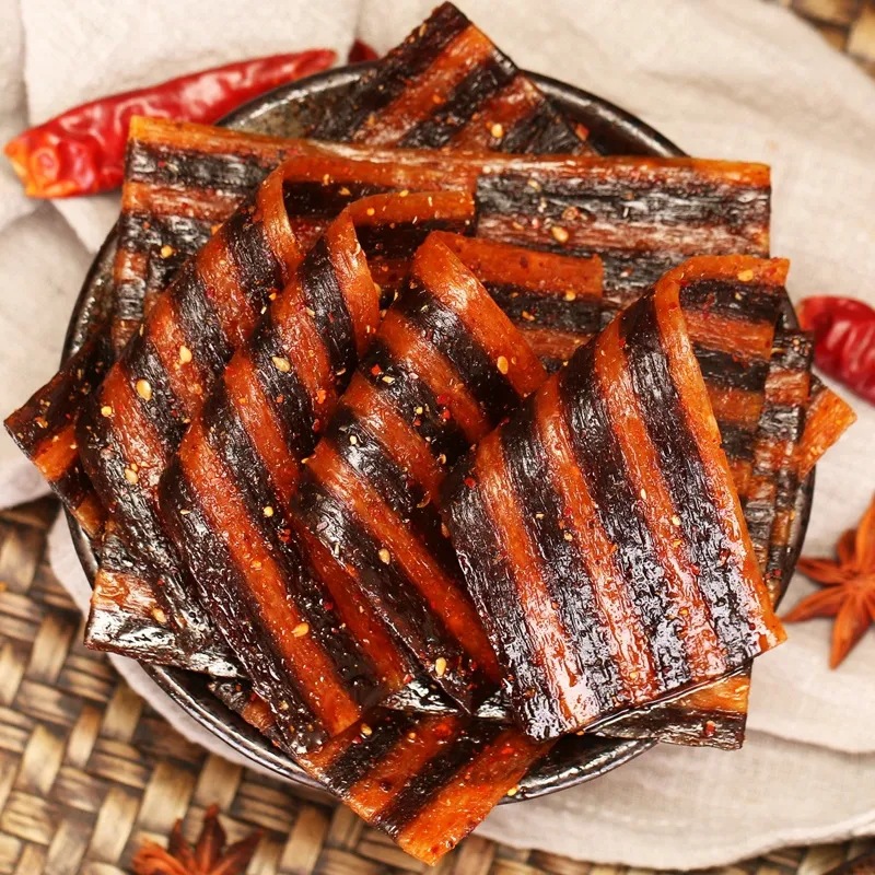 Zebra meat spicy strips wholesale in large quantities of childhood nostalgic spicy slices gluten spicy beans dried net red casual small packaging snacks