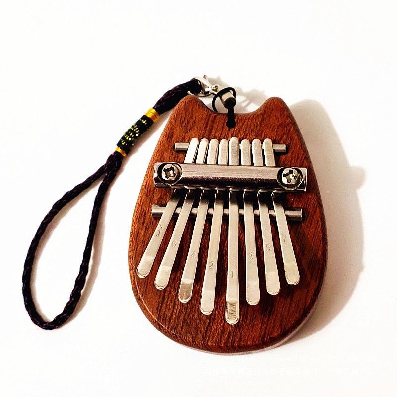 Mini 8-Tone Thumb Piano Kalimba, Handheld Mini Portable Cute Internet-Famous Carved Thumb Piano with 8 Tones