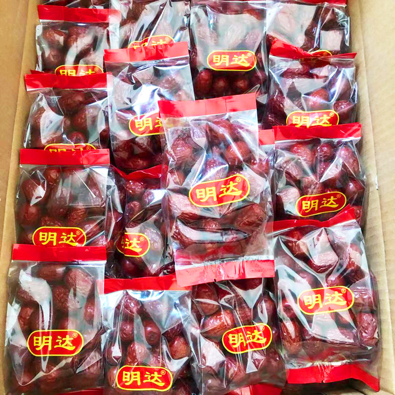 Wholesale small bag of red dates 100g Xinjiang specialty Ruoqiang gray jujube small meat multi-Box 100 bags of supermarket supply