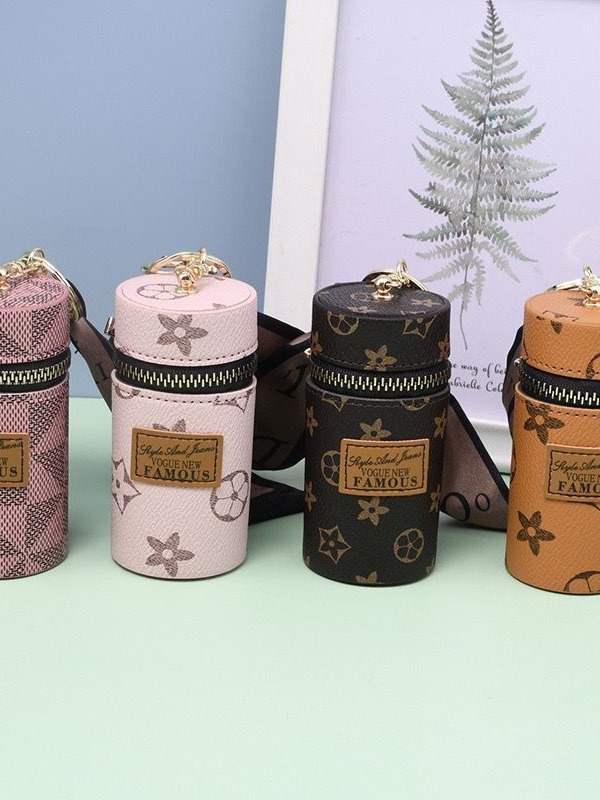 European and American presbyter coin purse 2023 new compact bag pendant earphone bag mouth red envelope mini keychain bag