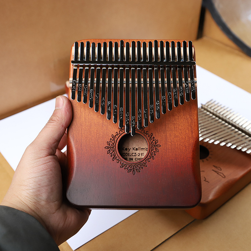 Thumb piano Kalimba 21-tone five-finger piano girl beginner's musical instrument kalimba finger piano genuine goods