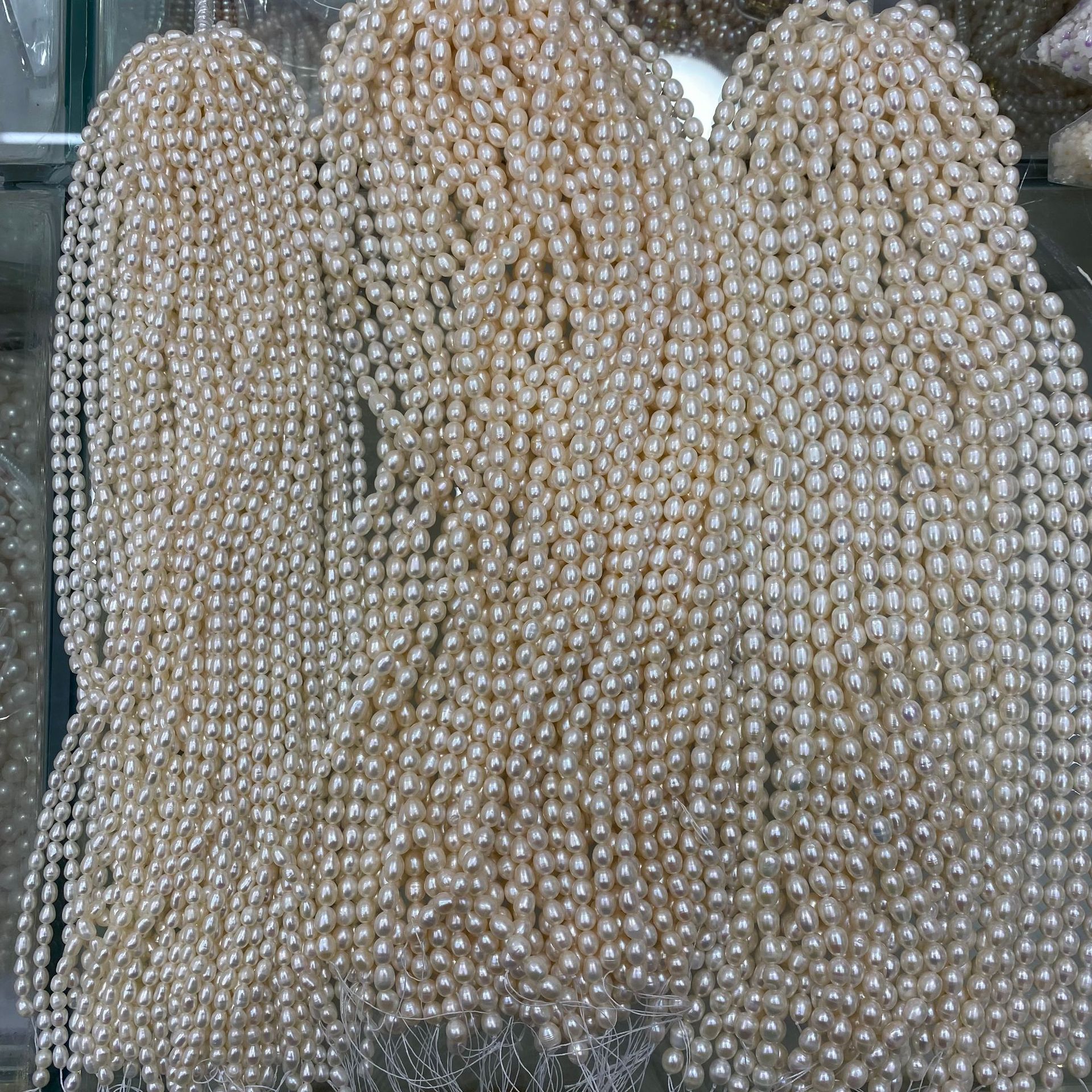 A variety of 5~6~7~8mm rice beads strong light light light pattern no flower skin natural freshwater pearl diy jewelry