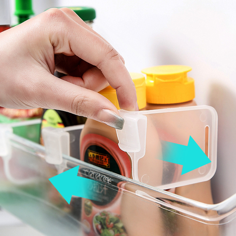 Household refrigerator partition plate finishing free adjustment snap-in type grid holder clip multi-functional finishing refrigerator door partition clip