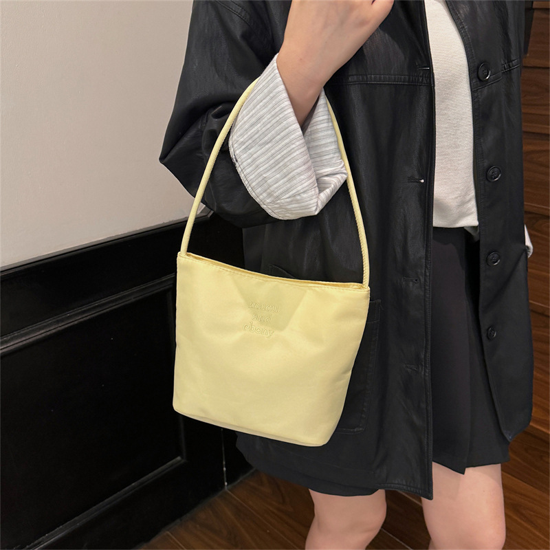 Korean Much and Ebong2024 New Bucket Bag Women's Simple Casual Versatile Handbag Nylon Armpit
