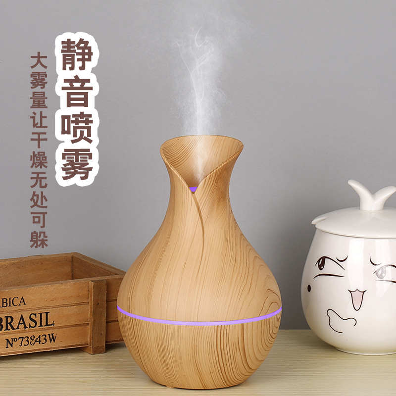Factory wholesale 200ML small vase aromatherapy machine portable usb car air conditioning humidifier mini humidifier