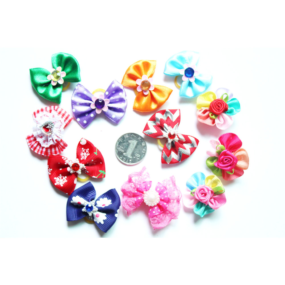 New pet holiday headdress small bow with diamond teddy bear headdress small rubber band Dog Head Flower Factory Outlet