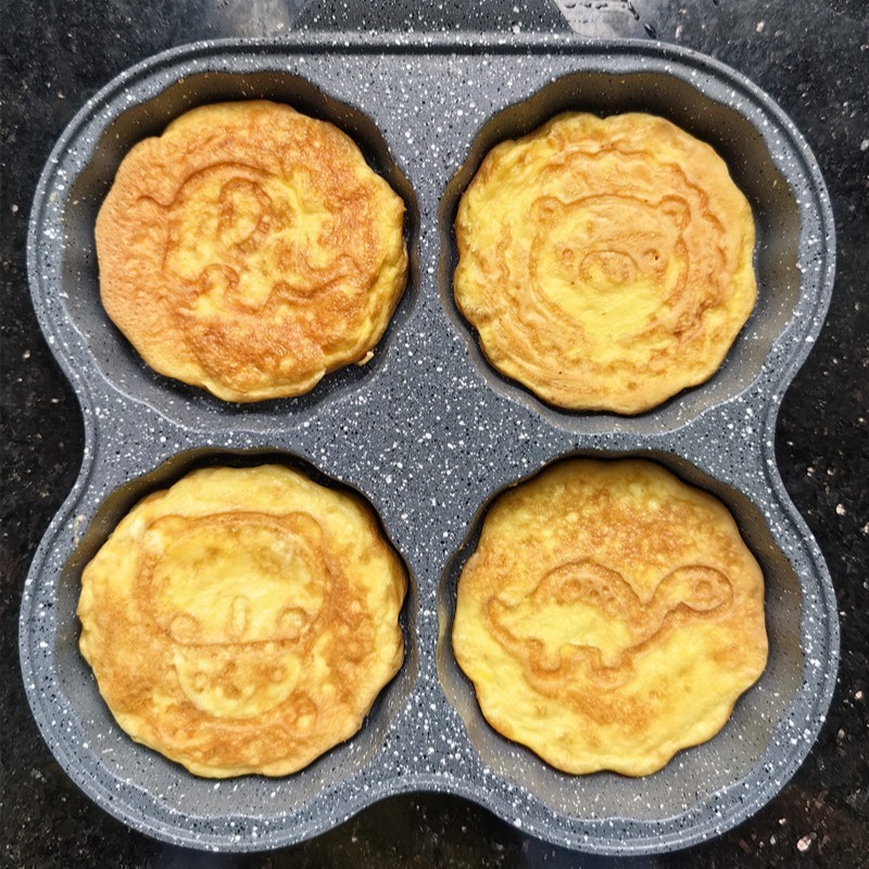 XY117 four-in-one egg frying pan egg hamburger pot deepening four-hole cartoon breakfast pot household pancake pan