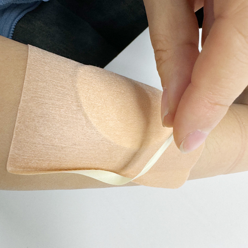 Skin color spunlace non-woven fabric with absorbent cotton core blank plaster acupuncture point navel sticker low sensitivity anti-seepage medicine mop strong viscosity