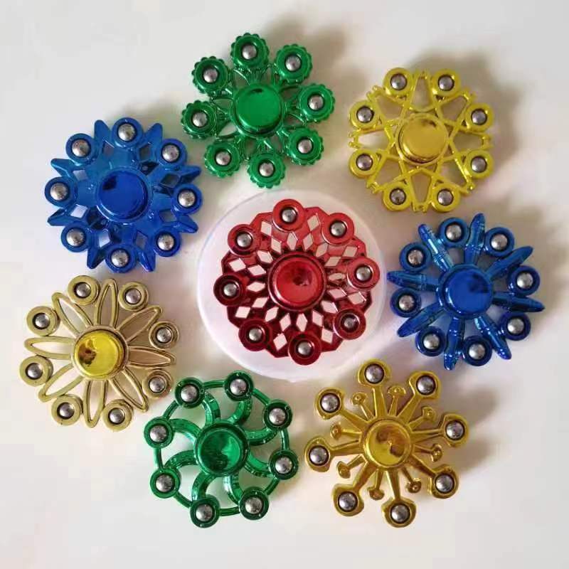 Factory direct supply electroplating colorful finger gyro steel ball gyro fingertip gyro children's palm toys stall toys