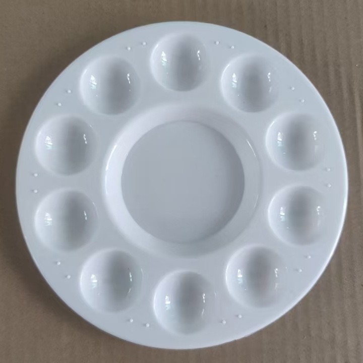 Wind brake plum blossom palette watercolor acrylic paint plate small feet palette round palette factory direct sales