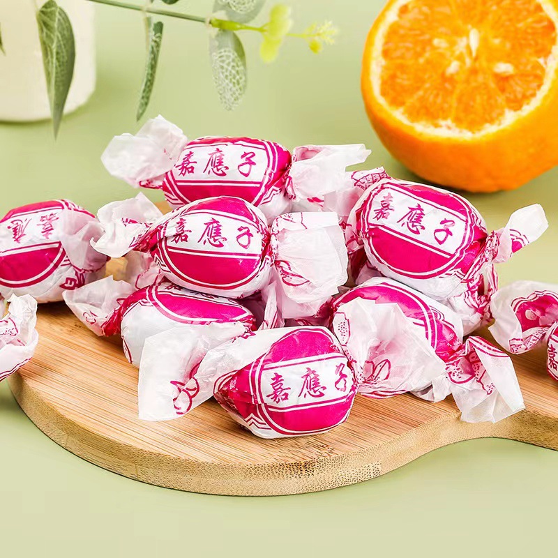 Paper-Wrapped Candied Plums with Tangerine Peel, Dried Sweet and Sour Plums, Childhood Snacks for Digestion