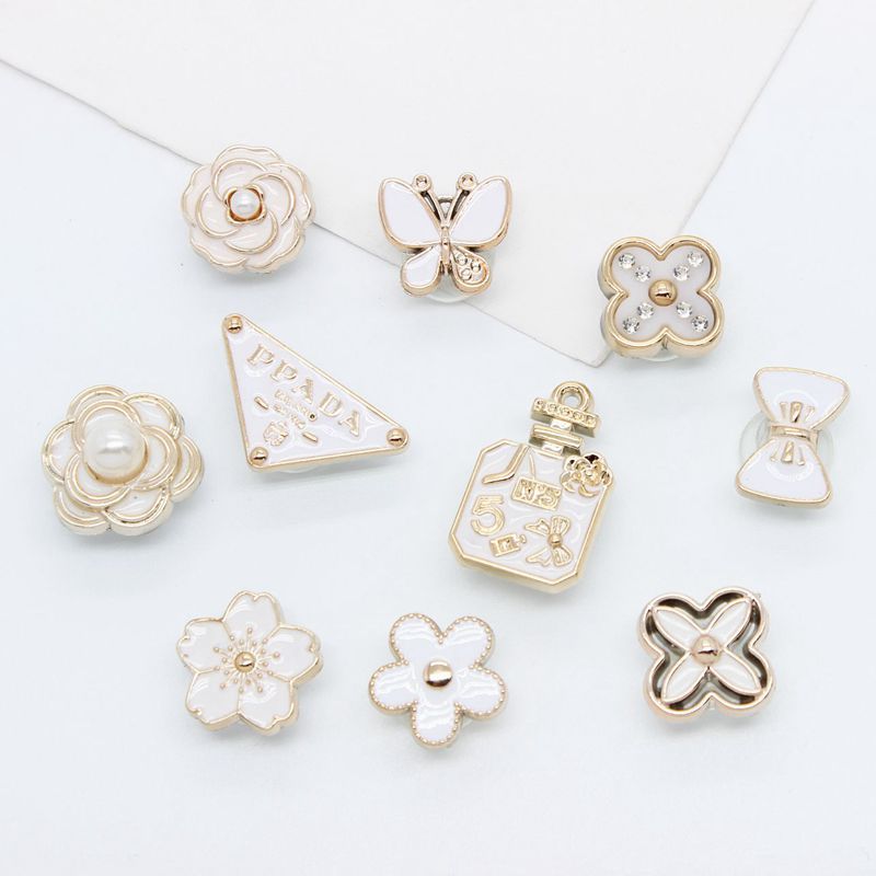 Kwai Sha cross-border resin Camellia pearl flower drop oil butterfly hole shoes buckle diy accessories shoes flower accessories hair accessories