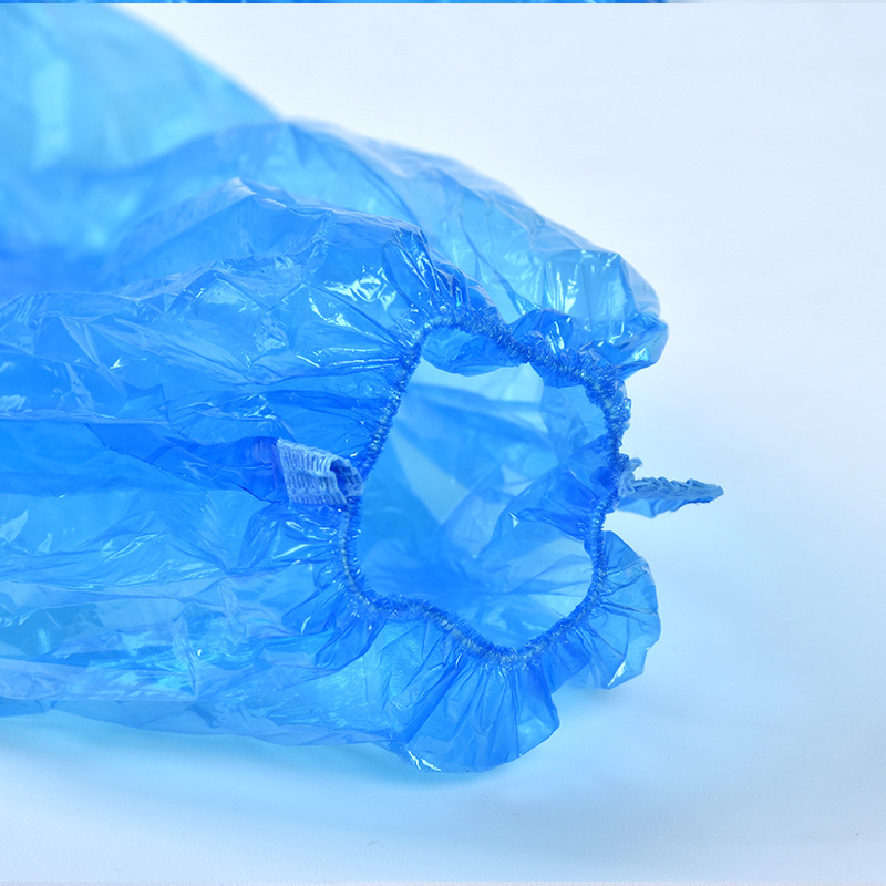 Factory in stock disposable PE mechanism oversleeves blue white waterproof transparent plastic oversleeves 100 pcs/bag