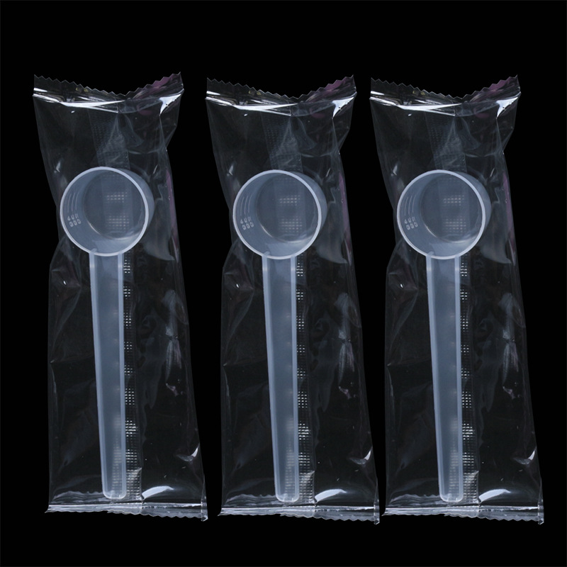 Separate packaging 5G measuring spoon 5g plastic spoon flat bottom powder liquid measuring spoon mask spoon with scale three colors
