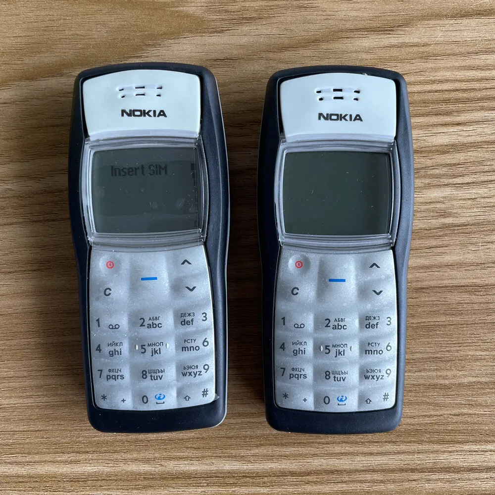 Foreign Trade 1100 Straight Button Yellow Screen Classic Nostalgic Mobile Phone for the Elderly Durable Sentimental Backup Phone