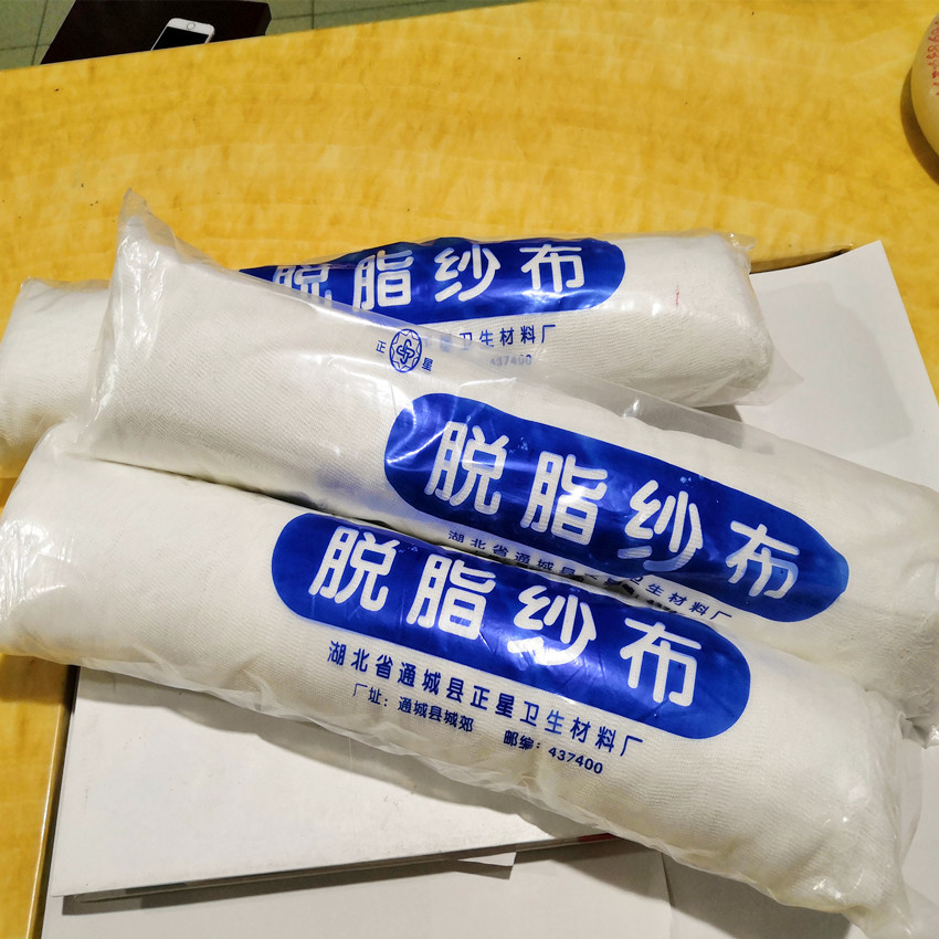 Factory wholesale absorbent gauze medical km roll fine gauze silicone mold reinforcement textile cotton gray cloth