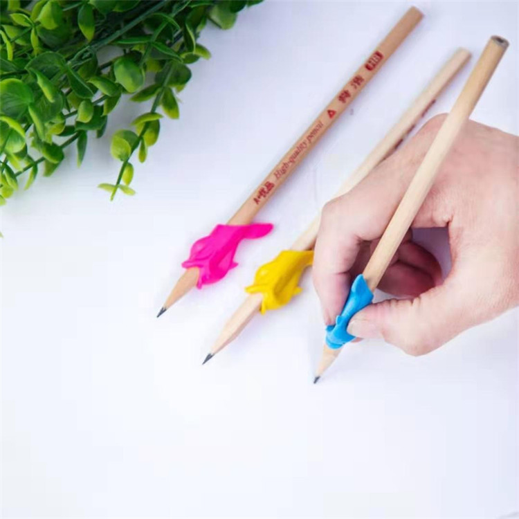 New Dolphin Creative Silicone Small Fish Pen Grip for Children and Students Writing Pen Corrector Wholesale