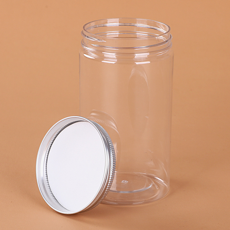 Spot wholesale transparent plastic sealed jar aluminum lid round food packaging honey jar scented tea packaging jar