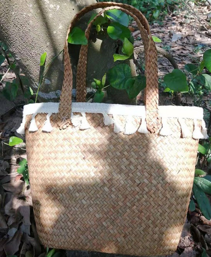 Seaweed woven fashion straw women's bag factory wholesale shoulder handbag cosmetic storage bag beach bag