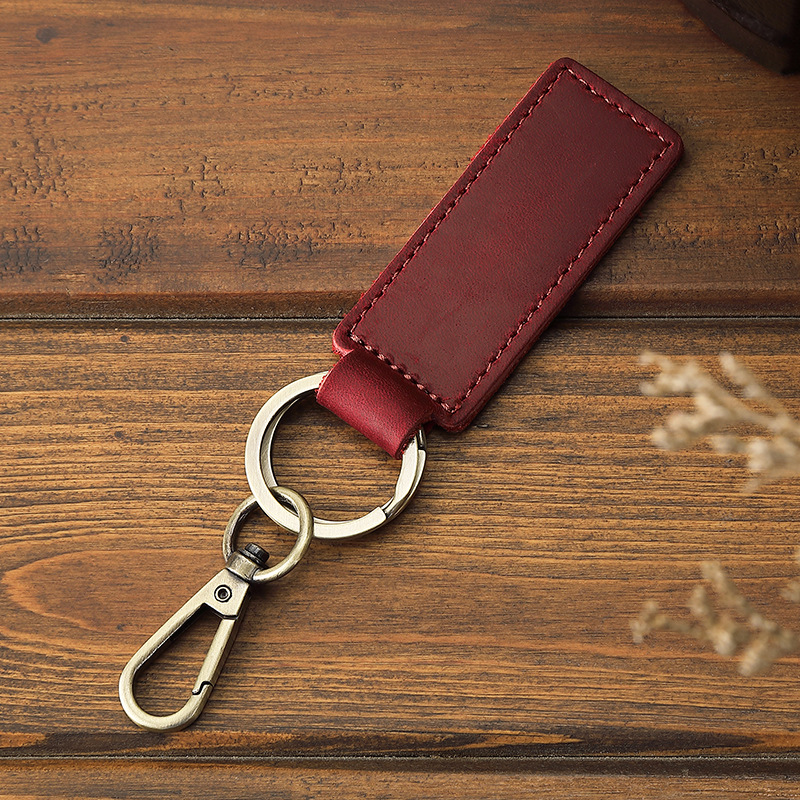 Creative key pendant keychain anti-lost car crazy horse scalper leather keychain factory wholesale