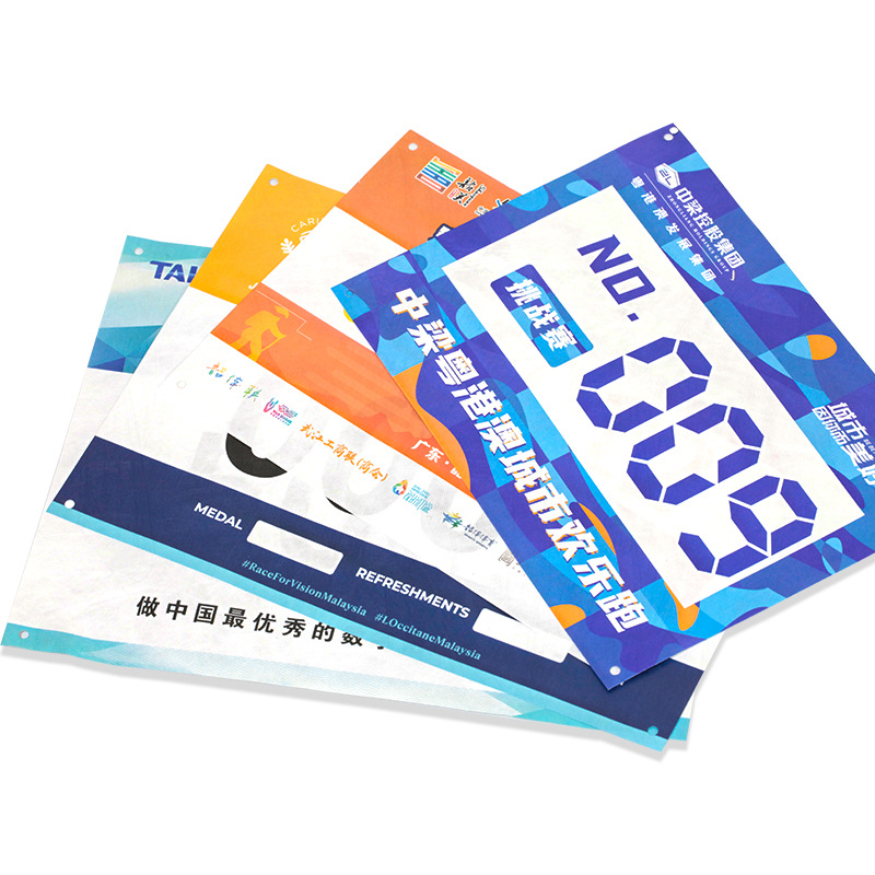 About one DuPont paper sports meeting number cloth book OEM custom marathon event sticker number stickers