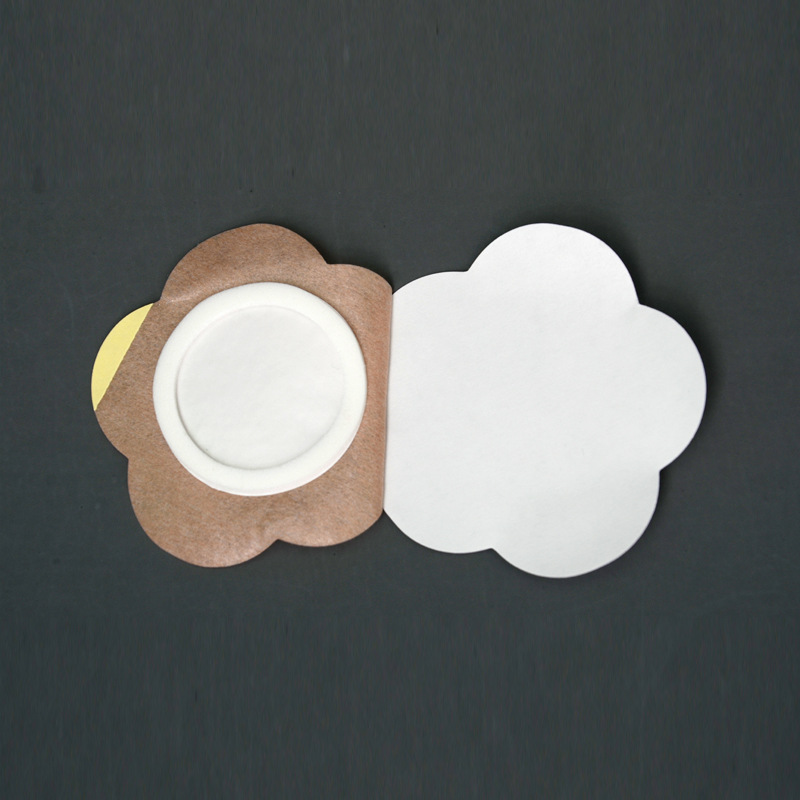 Plum blossom skin color non-woven three-volt patch moxibustion patch breathable dressing patch baby navel patch health care patch manufacturers wholesale