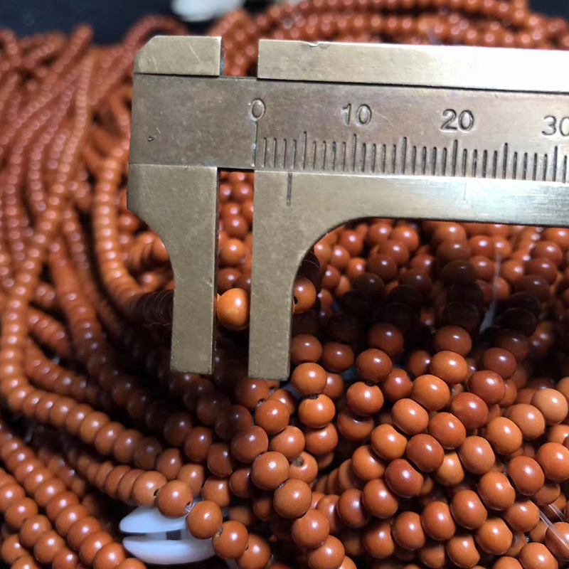 Olive nuclear carving nuclear pointed beads 4.5mm apple round small round beads spacer beads light beads old oil nuclide beads wholesale