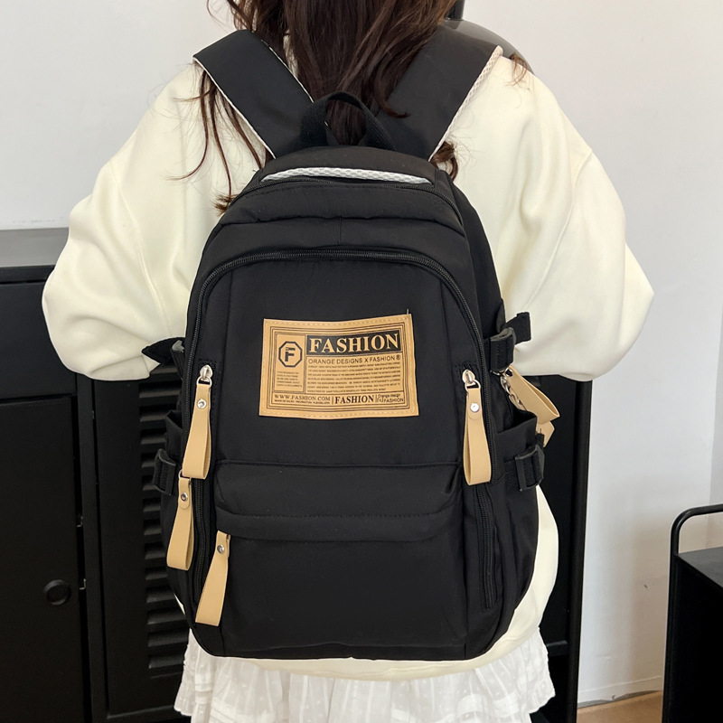 Новые кросс-бордерные школьные сумки для девушек 2025 года нейлоновые ретро простые для учеников средней школы мужские большие вместительные школьные сумки