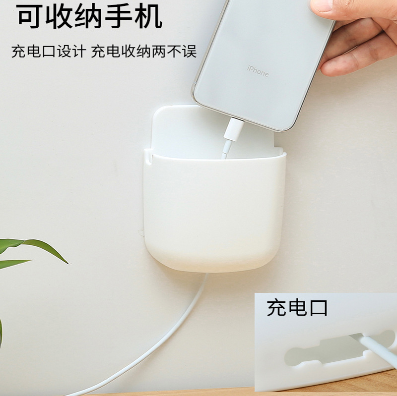 Mobile phone storage box free punch creative wall-mounted bedside mobile phone TV air conditioner remote control rack wholesale