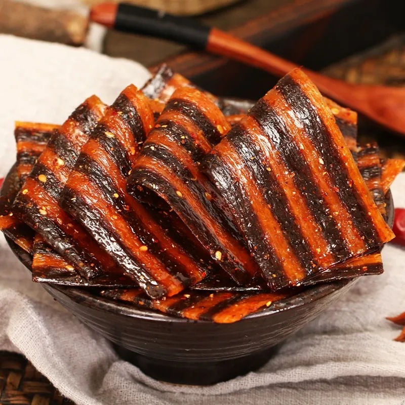 Zebra meat spicy strips wholesale in large quantities of childhood nostalgic spicy slices gluten spicy beans dried net red casual small packaging snacks