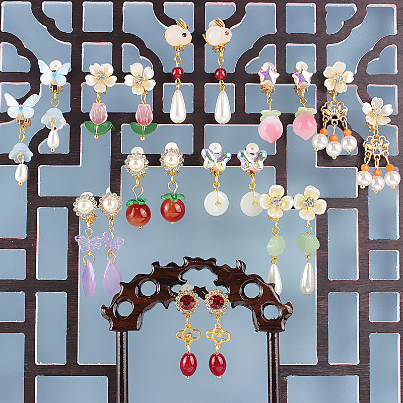 Antique 2023 earrings without ear holes children's ear clip colored glaze fairy stars children's ear accessories wholesale women