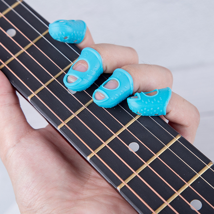 Guitar silicone finger sleeve guitar finger sleeve protective cover anti-pain beginner practice Press string finger sleeve pull string sweep string