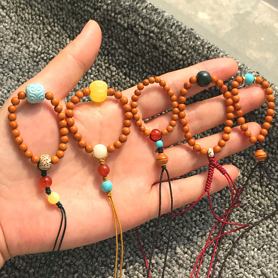 Natural olive nuclear hand twist single circle simple men's and women's cultural play pendant finger bracelet couples golden rice bowl beads wholesale