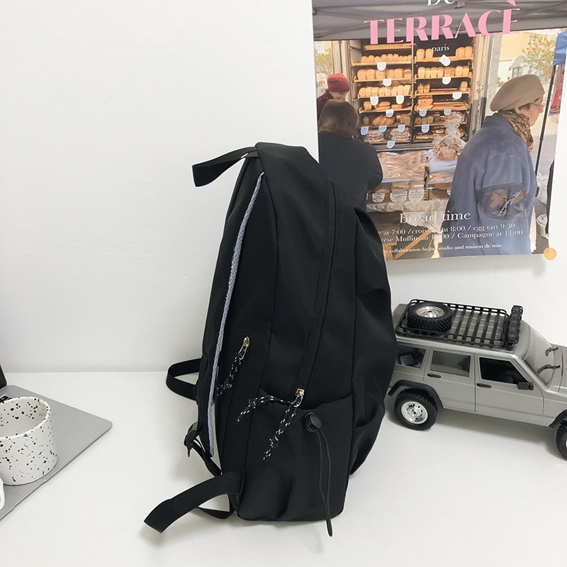 High school student schoolbag female college student lightweight travel bag simple casual backpack male fashion large capacity backpack summer