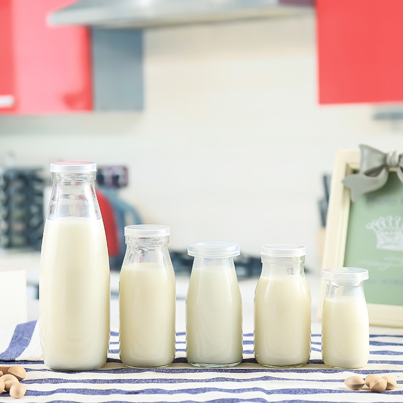 Factory wholesale high temperature resistant fresh milk bottle yogurt bottle plastic cover transparent glass bottle beverage bottle milk tea bottle