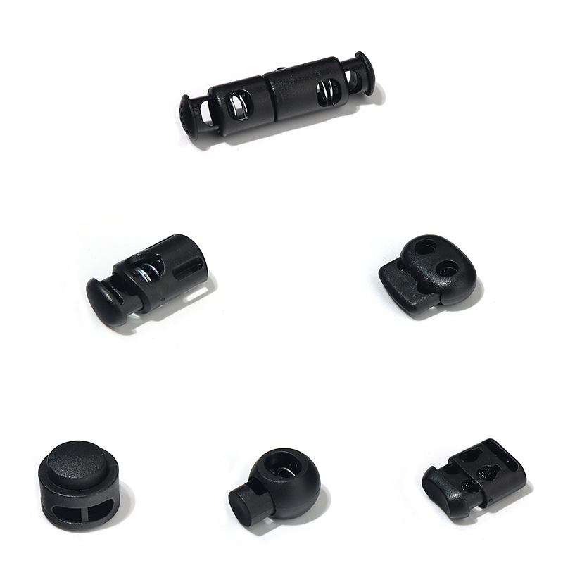 Plastic spring buckle single hole adjustable button hanging Bell cap double hole round through rope buckle black pig nose buckle cat eye buckle