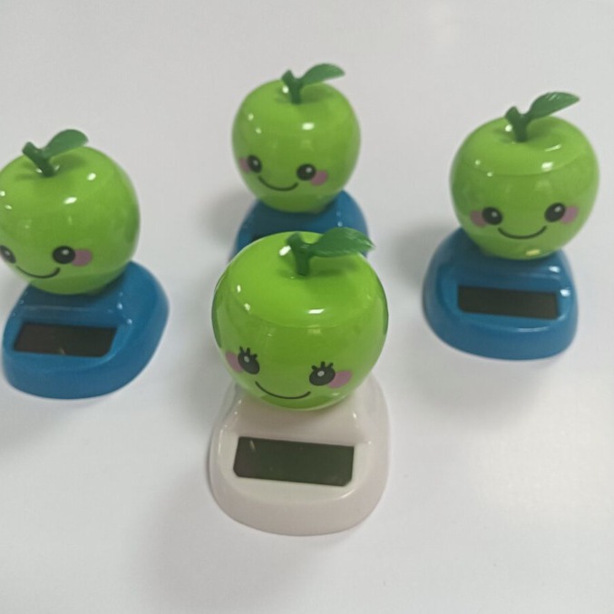 Hot Selling Apple Moving Solar Car Ornaments,left and Right Swing Toys