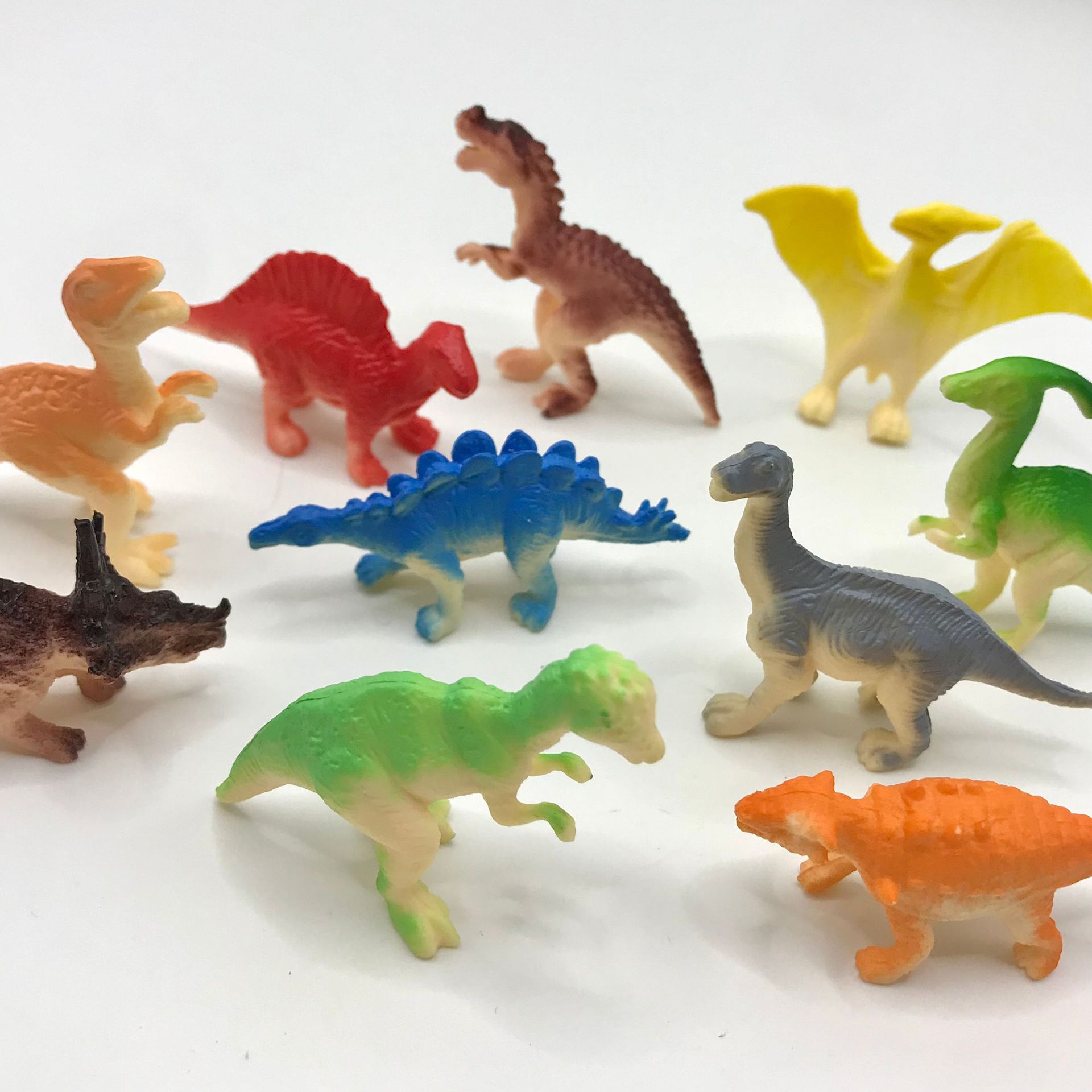 Simulation little dinosaur model 2-inch dinosaur toy pvc Jurassic dinosaur triangle dragon xunraptor kindergarten gift