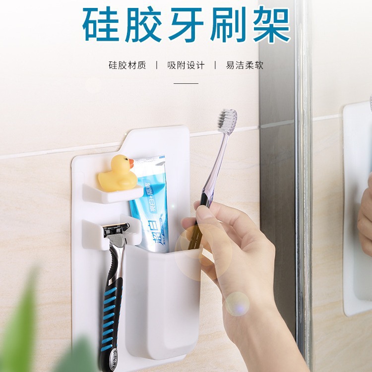 Manufacturer in stock wall-mounted silicone toothbrush holder silicone storage rack toothbrush storage rack punch-free bathroom storage rack